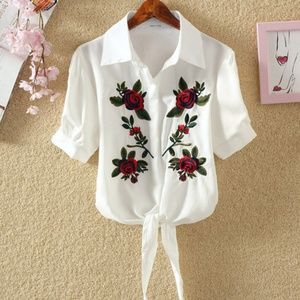 women white blouse with red rose embroidered